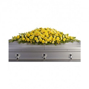 rangkaian bunga peti kuning untuk acara pemakaman